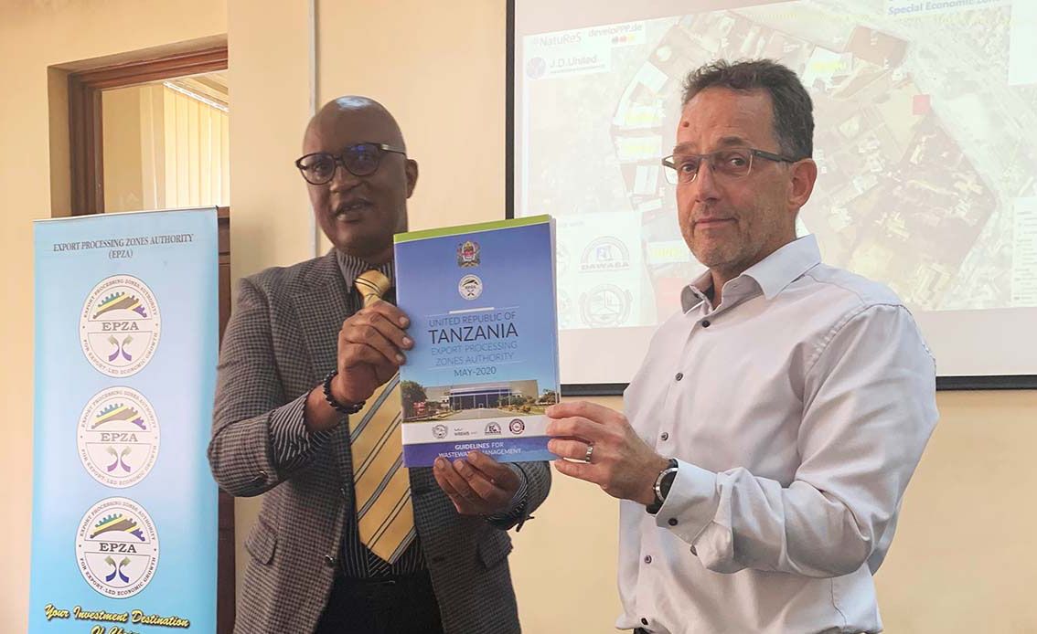 The EPZA Director of Investment Promotion and Facilitation Mr. James Maziku with GIZ-NatuReS Tanzania Country Coordinator Mr. Fridtjof Behnsen during the launch of the guidelines.
